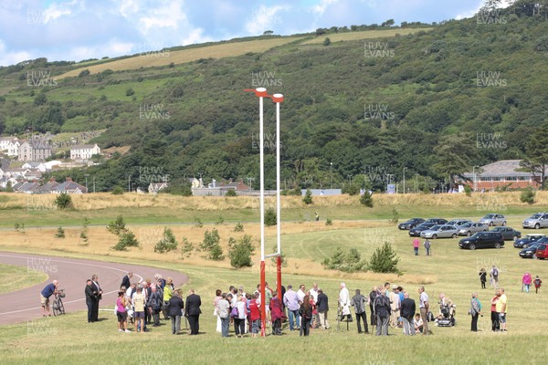 030813 - Unveiling of Stradey Park rugby posts and statue at  Sandy Park, Llanelli - Crowds gather to watch the unveiling of the statue at the newly located rugby posts from Llanelli's old Stradey Park at Sandy Park on the Millennium Coastal Path