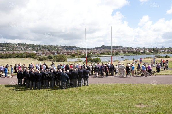 030813 - Unveiling of Stradey Park rugby posts and statue at  Sandy Park, Llanelli - Crowds gather to watch the unveiling of the statue at the newly located rugby posts from Llanelli's old Stradey Park at Sandy Park on the Millennium Coastal Path