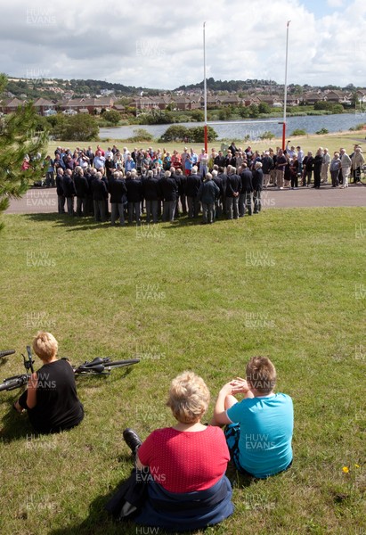 030813 - Unveiling of Stradey Park rugby posts and statue at  Sandy Park, Llanelli - Crowds gather to watch the unveiling of the statue at the newly located rugby posts from Llanelli's old Stradey Park at Sandy Park on the Millennium Coastal Path