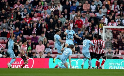 080325 - Sunderland v Cardiff City - Sky Bet Championship - Dimitrios Goutas of Cardiff City heads clear