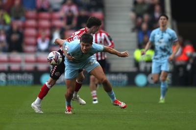 080325 - Sunderland v Cardiff City - Sky Bet Championship - Trai Hume of Sunderland and Rubin Colwill of Cardiff City