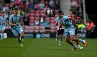 080325 - Sunderland v Cardiff City - Sky Bet Championship - Trai Hume of Sunderland and Rubin Colwill of Cardiff City