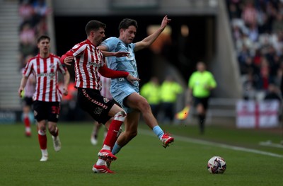 080325 - Sunderland v Cardiff City - Sky Bet Championship - Chris Mepham of Sunderland and Rubin Colwill of Cardiff City