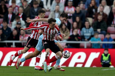 080325 - Sunderland v Cardiff City - Sky Bet Championship - Dan Neil of Sunderland and Rubin Colwill of Cardiff City