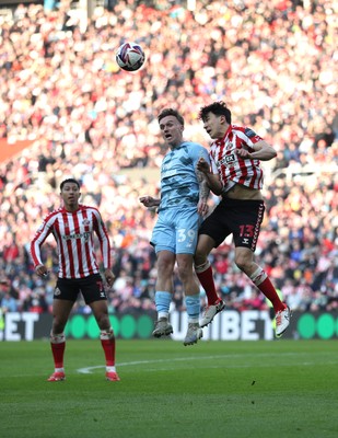 080325 - Sunderland v Cardiff City - Sky Bet Championship - Luke O'Nien of Sunderland and Isaak Davies of Cardiff City