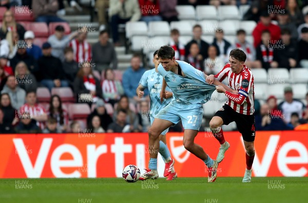 080325 - Sunderland v Cardiff City - Sky Bet Championship - Dan Neil of Sunderland and Rubin Colwill of Cardiff City