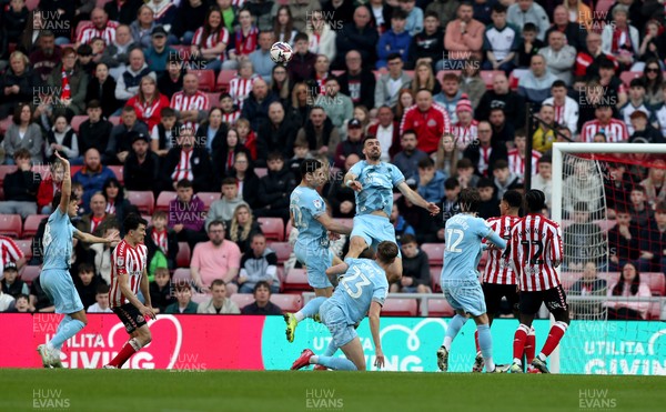 080325 - Sunderland v Cardiff City - Sky Bet Championship - Dimitrios Goutas of Cardiff City heads clear