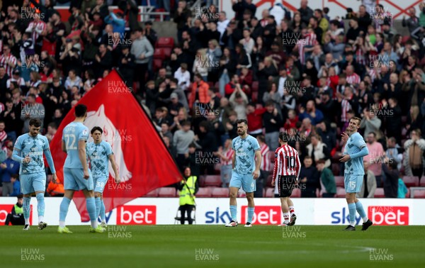 080325 - Sunderland v Cardiff City - Sky Bet Championship - Eliezer Mayenda of Sunderland puts his team 1-0 up Cardiff City players after going behind