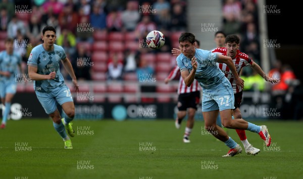 080325 - Sunderland v Cardiff City - Sky Bet Championship - Trai Hume of Sunderland and Rubin Colwill of Cardiff City