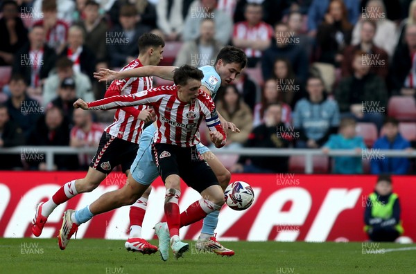 080325 - Sunderland v Cardiff City - Sky Bet Championship - Dan Neil of Sunderland and Rubin Colwill of Cardiff City