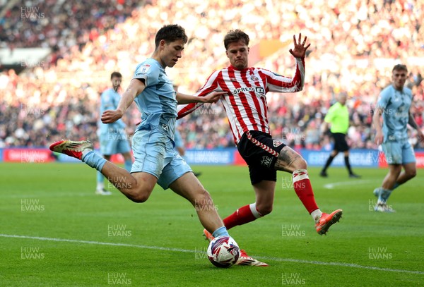 080325 - Sunderland v Cardiff City - Sky Bet Championship - Leo Fuhr Hjelde of Sunderland and Rubin Colwill of Cardiff City