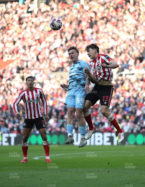 080325 - Sunderland v Cardiff City - Sky Bet Championship - Luke O'Nien of Sunderland and Isaak Davies of Cardiff City