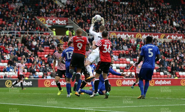 230917 - Sunderland v Cardiff City - Sky Bet Championship - An incident in the penalty area results in the referee awarding a penalty kick to Cardiff City and issuing a yellow card to Lamine Kone of Sunderland