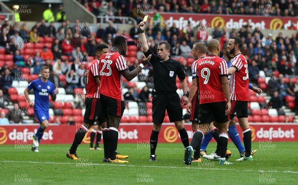 230917 - Sunderland v Cardiff City - Sky Bet Championship - An incident in the penalty area results in the referee awarding a penalty kick to Cardiff City and issuing a yellow card to Lamine Kone of Sunderland