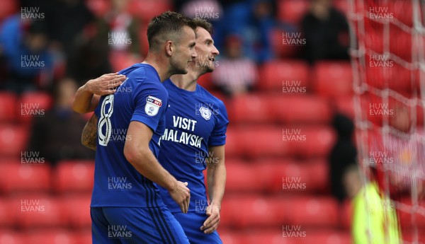 230917 - Sunderland v Cardiff City - Sky Bet Championship - Joe Ralls of Cardiff City celebrates with Craig Bryson after scoring from the penalty spot to make the score 1-2