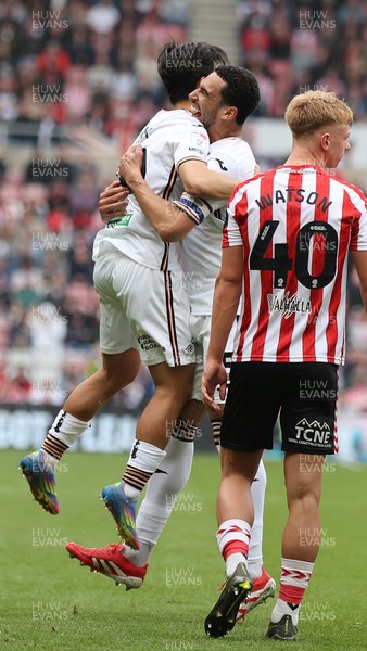 120425 - Sunderland v Swansea City - Sky Bet Championship - Ben Cabango of Swansea celebrates scoring the 1st goal of the match with Eom Ji-sung of Swansea