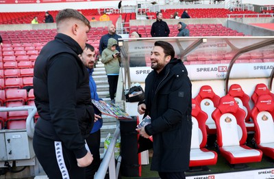 140123 - Sunderland v Swansea City - Sky Bet Championship - Swansea City head coach Russell Martin signs an autograph