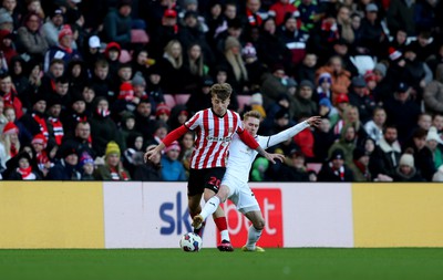 140123 - Sunderland v Swansea City - Sky Bet Championship - Jack Clarke of Sunderland and Ollie Cooper of Swansea City