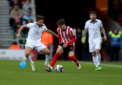 140123 - Sunderland v Swansea City - Sky Bet Championship - Trai Hume of Sunderland and Joe Allen of Swansea City