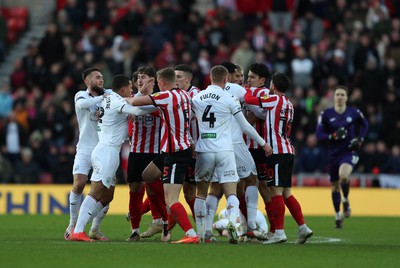 140123 - Sunderland v Swansea City - Sky Bet Championship - Players come together after a challenge by Luke O'Nien of Sunderland who is then sent off