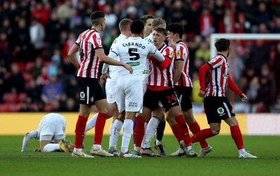 140123 - Sunderland v Swansea City - Sky Bet Championship - Players come together after a challenge by Luke O'Nien of Sunderland who is then sent off