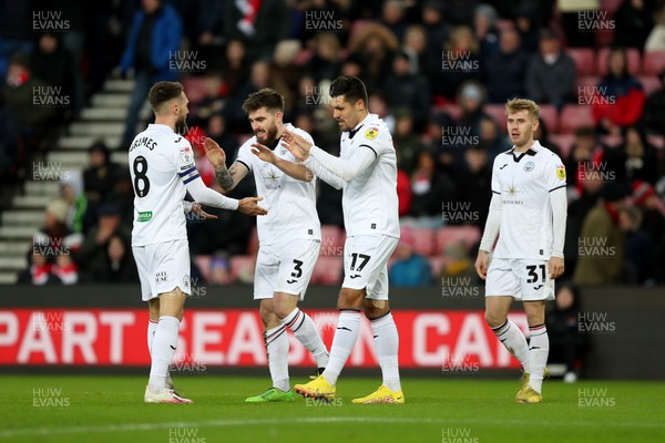 140123 - Sunderland v Swansea City - Sky Bet Championship -  Joel Piroe of Swansea City celebrates with team mates after putting his side 1-0 up
