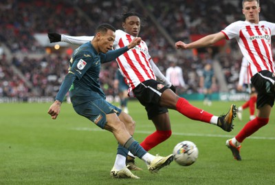 240224 - Sunderland v Swansea City - Sky Bet Championship - Ronald of Swansea and Romaine Mundle of Sunderland AFC