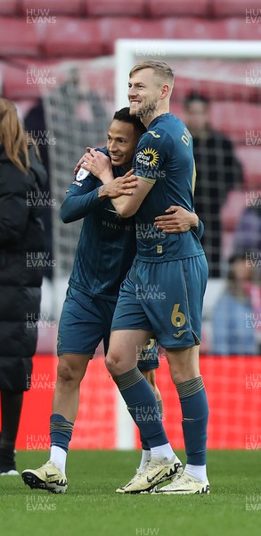 240224 - Sunderland v Swansea City - Sky Bet Championship - Ronald of Swansea and Harry Darling of Swansea hug at the end of the match