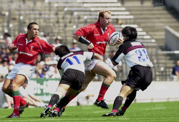 030601 - Suntory v Wales - Gareth Thomas is caught by Toru Kurihara and Daisuke Yamaguchi