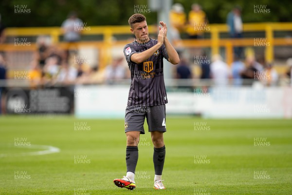 300722 - Sutton United v Newport County - Sky Bet League 2 - Sam Bowen of Newport County applauds the fans