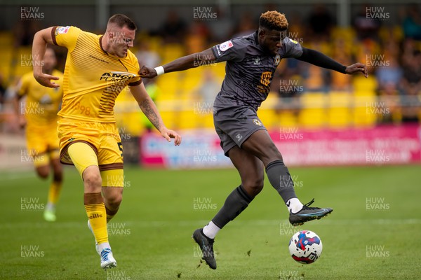 300722 - Sutton United v Newport County - Sky Bet League 2 - Offrande Zanzala of Newport County controls the ball