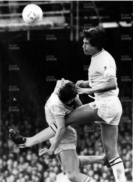 02.10.82 - Swansea City v Spurs. Gary Mabbutt folds as Jeremy Charles heads. 