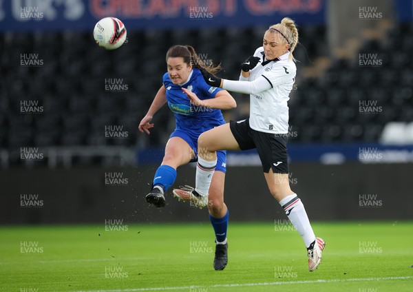 041222 - Swansea City Ladies v Cardiff City Women, Genero Adran Premier League - Siobhan Walsh of Cardiff City Women clears as Kelly Adams of Swansea City Ladies closes in