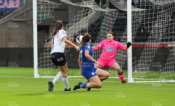 041222 - Swansea City Ladies v Cardiff City Women, Genero Adran Premier League - Katy Hosford of Swansea City Ladies beats Cardiff City Women goalkeeper Ceryn Chamberlain as she shoots to score the opening goal