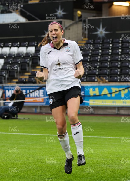 041222 - Swansea City Ladies v Cardiff City Women, Genero Adran Premier League - Katy Hosford of Swansea City Ladies celebrates after beats Cardiff City Women goalkeeper Ceryn Chamberlain as she shoots to score the opening goal