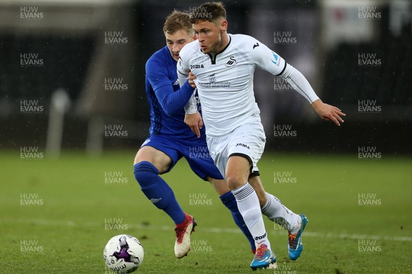 010518 - Swansea City U19s v Cardiff City U19s - FAW Youth Cup Final - Kieran Evans of Swansea is challenged by Mark Harris of Cardiff