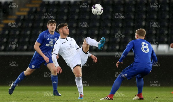 010518 - Swansea City U19s v Cardiff City U19s - FAW Youth Cup Final - Kieran Evans of Swansea is challenged by Laurence Wootton of Cardiff