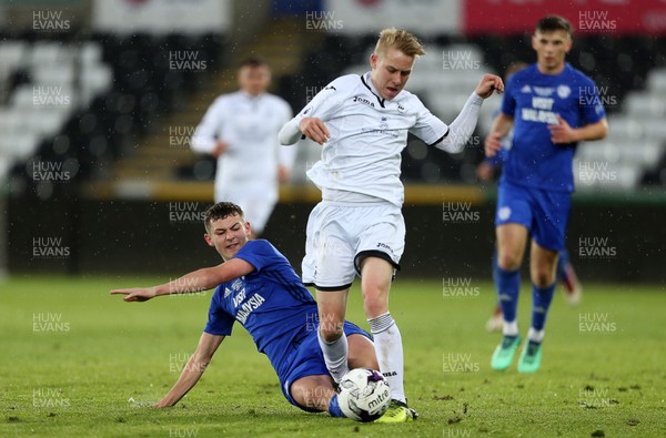010518 - Swansea City U19s v Cardiff City U19s - FAW Youth Cup Final - Oliver Cooper of Swansea is tackled by Connor Davies of Cardiff