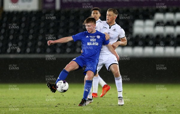 010518 - Swansea City U19s v Cardiff City U19s - FAW Youth Cup Final -Issac Davies of Cardiff is challenged by Joe Lewis of Swansea