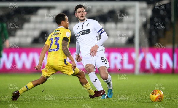 051218 - Swansea City U21s v Bristol Rovers - Checkatrade Trophy Round 2 - Cian Harries of Swansea City is challenged by Kyle Bennett of Bristol Rovers