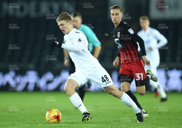 240117 - Swansea City Under 21s v Coventry - Checkatrade Trophy - George Byers of Swansea City gets into space