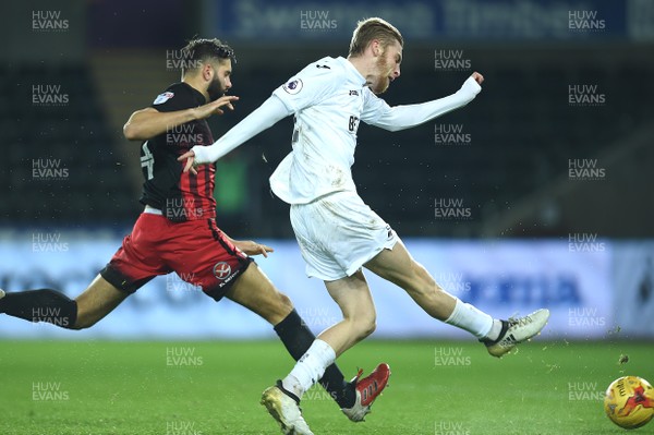 240117 - Swansea City Under 21s v Coventry - Checkatrade Trophy - Oliver McBurnie of Swansea City tries a shot at goal