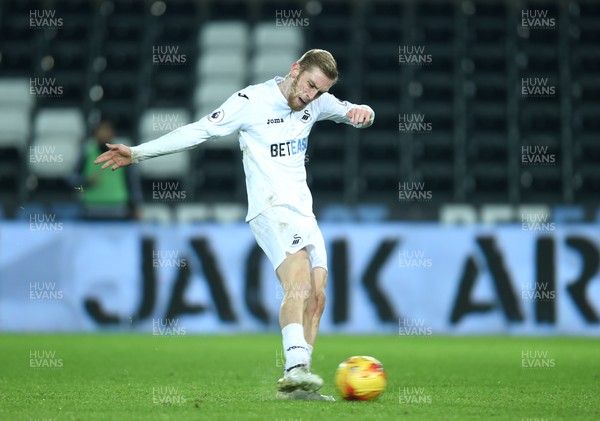 240117 - Swansea City Under 21s v Coventry - Checkatrade Trophy - Oliver McBurnie of Swansea City scores from the penalty spot