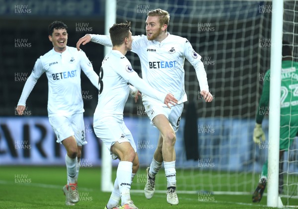 240117 - Swansea City Under 21s v Coventry - Checkatrade Trophy - Oliver McBurnie of Swansea City celebrates his goal with Adnan Maric (left)