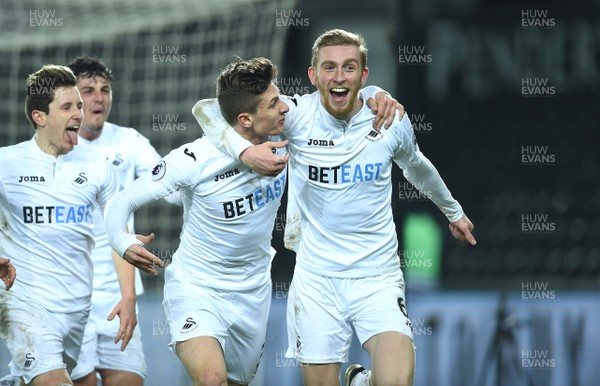 240117 - Swansea City Under 21s v Coventry - Checkatrade Trophy - Oliver McBurnie of Swansea City celebrates his goal with Adnan Maric (left)