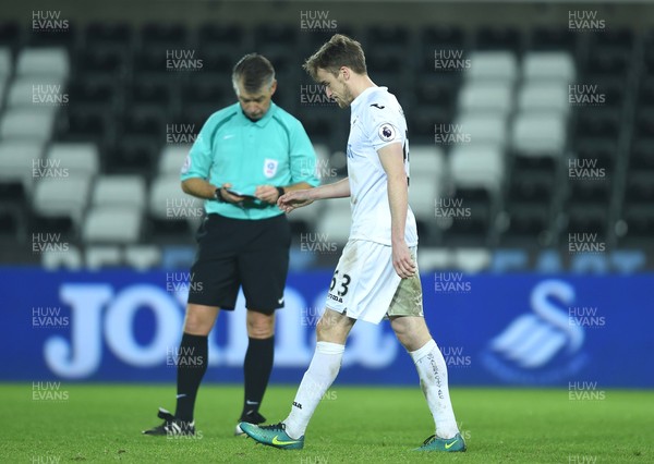 240117 - Swansea City Under 21s v Coventry - Checkatrade Trophy - Ryan Blair of Swansea City looks dejected after his penalty attempt