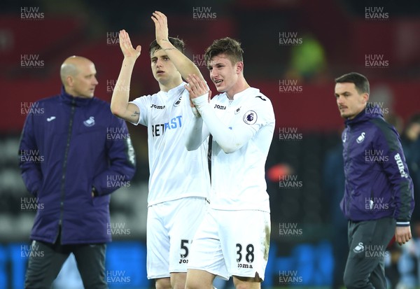 240117 - Swansea City Under 21s v Coventry - Checkatrade Trophy - Keston Davies and Adnan Maric of Swansea City look dejected at the end of the game