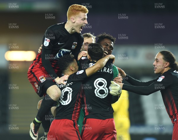 240117 - Swansea City Under 21s v Coventry - Checkatrade Trophy - Coventry players celebrate their penalty win