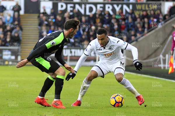 251117 - Swansea City v AFC Bournemouth, Premier League - Martin Olsson of Swansea City (right) in action with Adam Smith of AFC Bournemouth