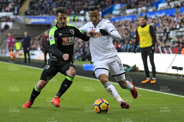251117 - Swansea City v AFC Bournemouth, Premier League - Martin Olsson of Swansea City (right) in action with Adam Smith of AFC Bournemouth
